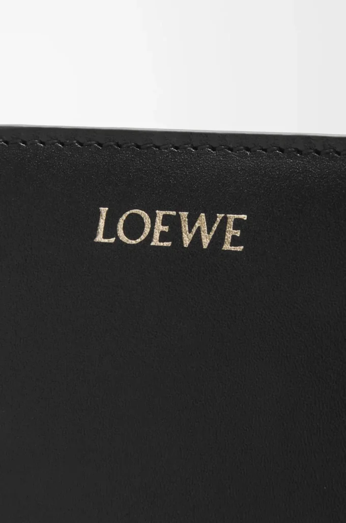 Portefeuille compact Knot en cuir de veau nappa brillant Noir/Orange vif