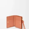 Portefeuille compact Knot en cuir de veau nappa brillant Tan/Papaya Portefeuille compact Knot en cuir de veau nappa brillant Tan/Papaya
