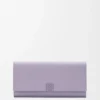 Portefeuille continental Anagram en cuir de veau grainé Dirty Mauve Portefeuille continental Anagram en cuir de veau grainé Dirty Mauve