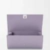 Portefeuille continental Anagram en cuir de veau grainé Dirty Mauve Portefeuille continental Anagram en cuir de veau grainé Dirty Mauve