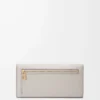 Portefeuille continental Anagram en cuir de veau grainé Light Ghost Grey