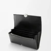 Portefeuille continental Pebble en cuir de veau mini grain Noir Portefeuille continental Pebble en cuir de veau mini grain Noir
