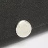 Portefeuille continental Pebble en cuir de veau mini grain Noir Portefeuille continental Pebble en cuir de veau mini grain Noir