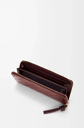 Portefeuille zippé slim à nœud en cuir d&rsquo;anguille Dark Burgundy