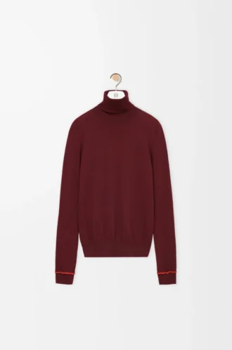 Pull en laine bordeaux/orange