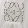 Robe drapée en soie blanche