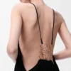 Robe drapée en soie noire