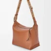 Sac à bandoulière Cubi en cuir de veau lisse et souple et jacquard beige