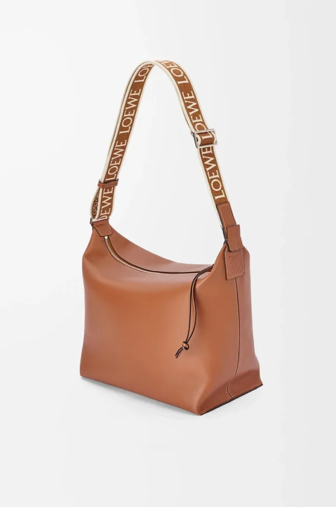 Sac à bandoulière Cubi en cuir de veau lisse et souple et jacquard beige