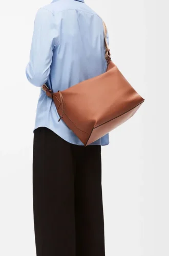 Sac à bandoulière Cubi en cuir de veau lisse et souple et jacquard beige