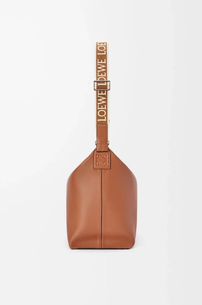 Sac à bandoulière Cubi en cuir de veau lisse et souple et jacquard beige