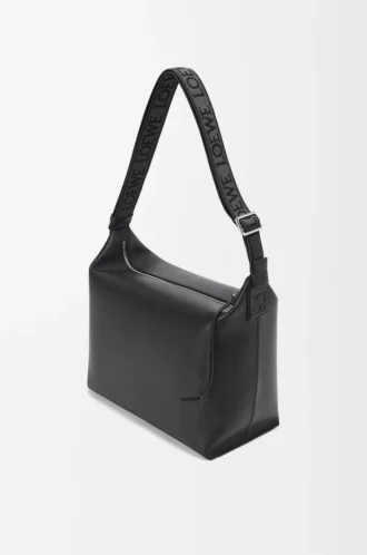 Sac à bandoulière Cubi en cuir de veau lisse et souple et jacquard noir