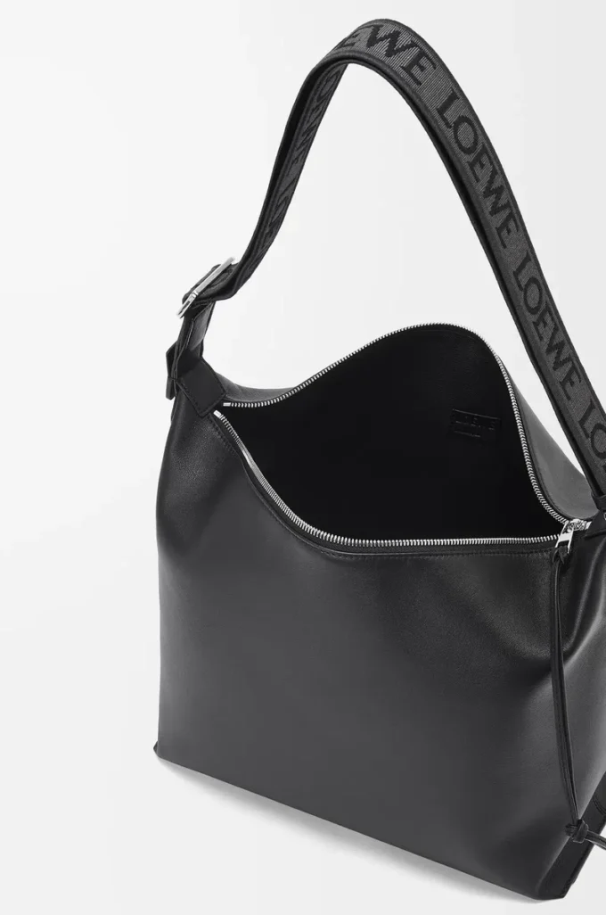 Sac à bandoulière Cubi en cuir de veau lisse et souple et jacquard noir