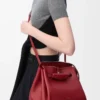 Sac Madrid moyen en cuir de veau souple rouge brûlé