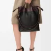 Sac à main Flamenco en cuir d’agneau nappa souple Noir/Marron foncé Sac à main Flamenco en cuir d’agneau nappa souple Noir/Marron foncé