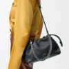 Sac à main Flamenco moyen en cuir de veau grainé fin Noir