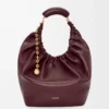 Sac Squeeze moyen en cuir d&rsquo;agneau nappa souple Dark Burgundy