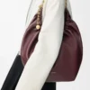 Sac Squeeze moyen en cuir d&rsquo;agneau nappa souple Dark Burgundy