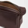Sacoche Pebble moyenne en cuir de veau grainé souple, couleur oxblood