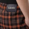 Short en laine mélangée orange/noir