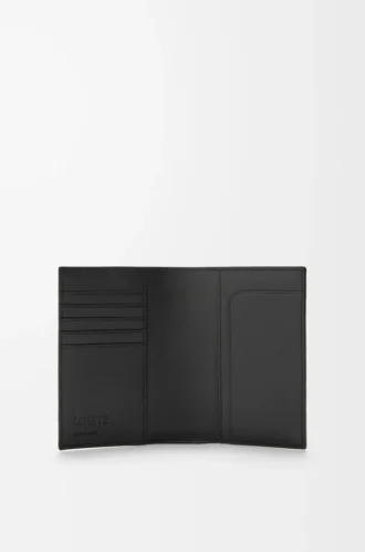 Étui passeport Puzzle en cuir de veau grainé souple Noir