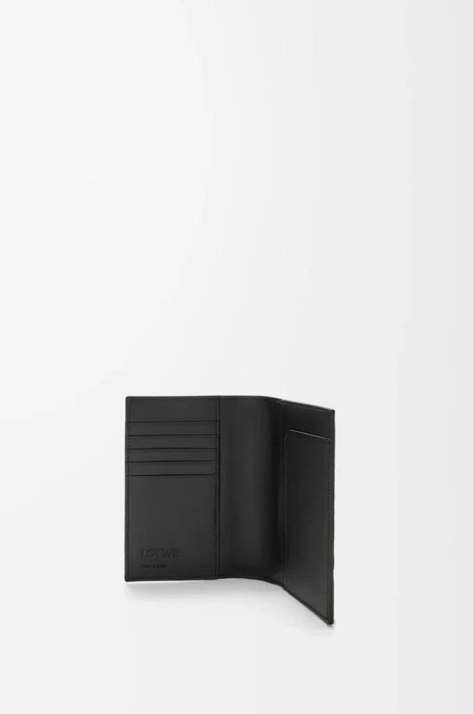 Étui passeport Puzzle en cuir de veau grainé souple Noir