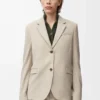 Veste ajustée en laine beige clair mélangé
