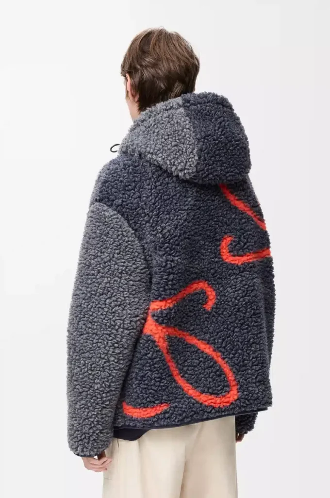 Veste à capuche en laine mélangée bleu marine/orange Veste à capuche en laine mélangée bleu marine/orange