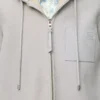 Veste à capuche en peau lainée gris clair chiné