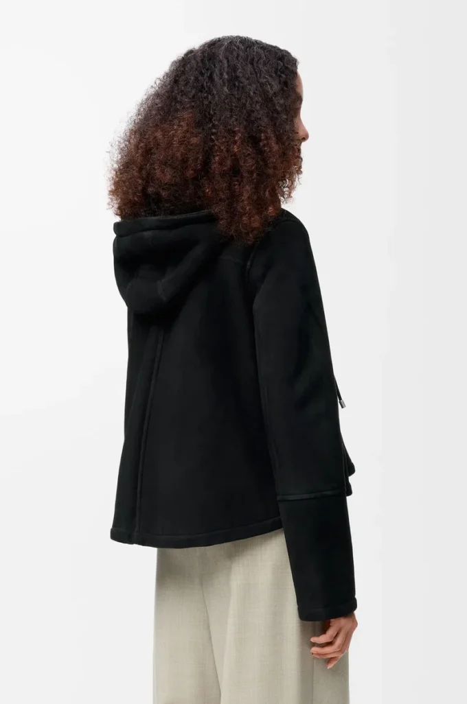 Veste à capuche en peau lainée noire