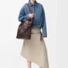 Veste drapée en denim bleu indigo
