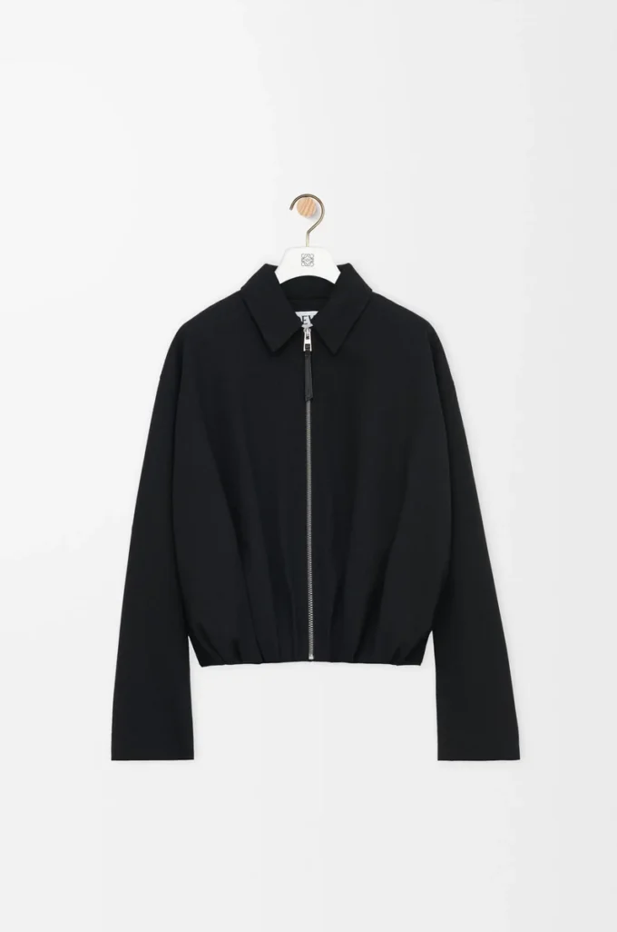 Veste drapée en laine noire