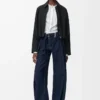Veste drapée en laine noire