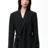 Veste drapée en laine noire