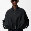 Veste drapée en laine noire