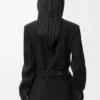 Veste drapée en laine noire