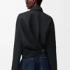 Veste drapée en laine noire
