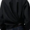 Veste drapée en laine noire