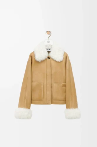 Veste en peau lainée blanche/dorée