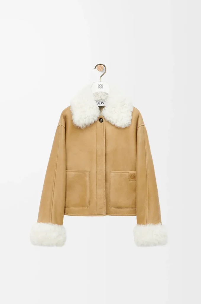 Veste en peau lainée blanche/dorée