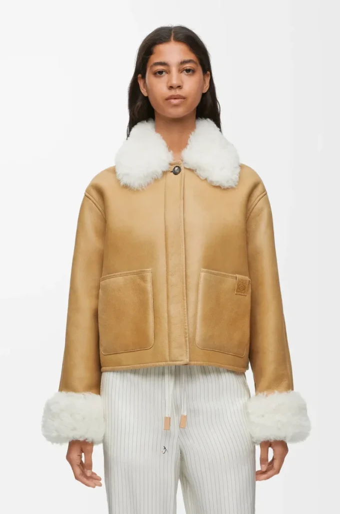 Veste en peau lainée blanche/dorée