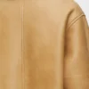 Veste en peau lainée blanche/dorée