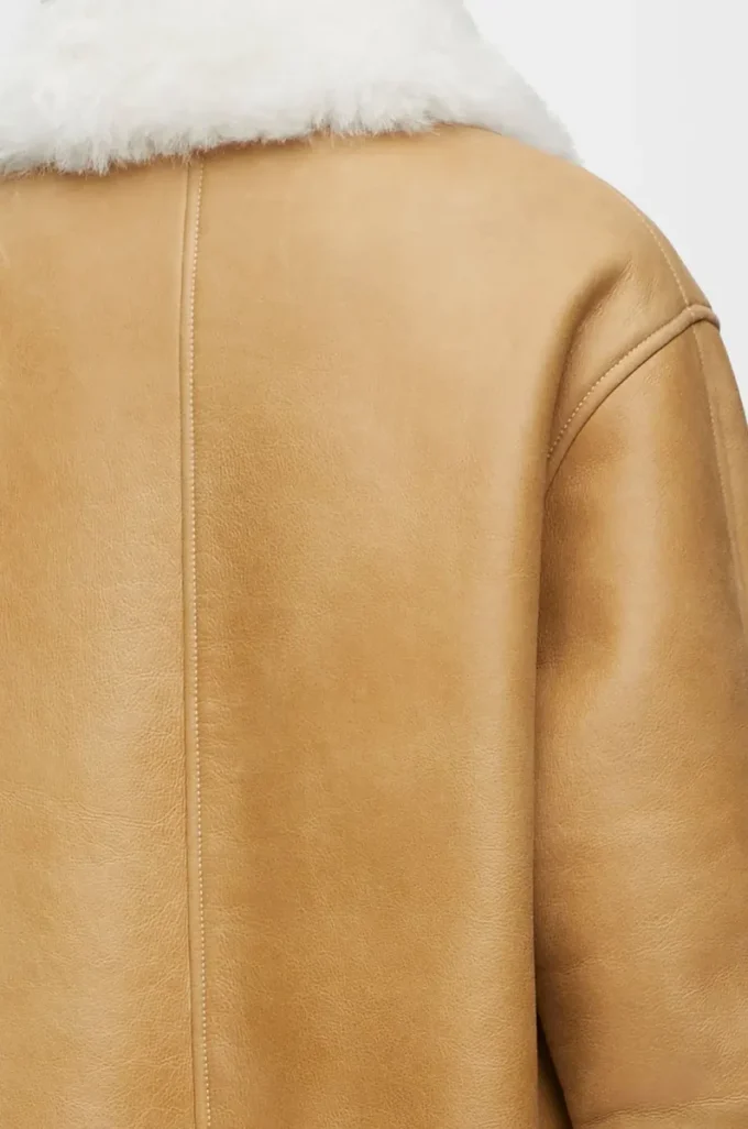 Veste en peau lainée blanche/dorée